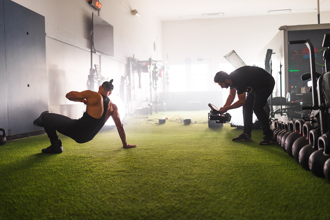 a-man-and-a-woman-doing-exercises-in-a-gym-yjqit5ycua0